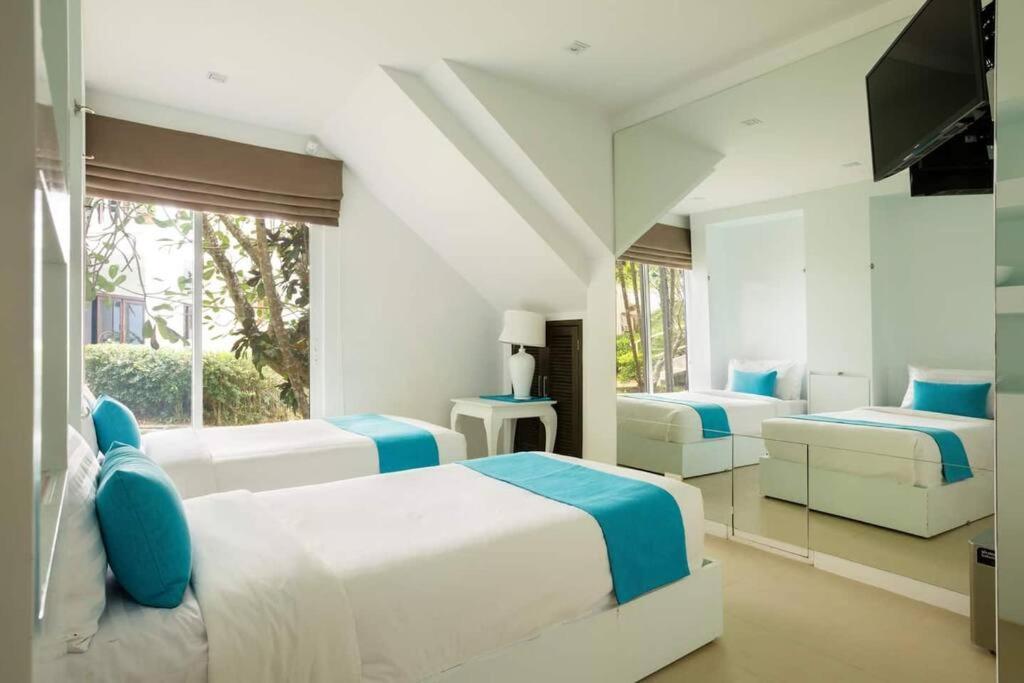 Villa Nirvana - Beachfront Tropical Chic 4Br Haven In Cape Panwa, Phuket บ้านมะขาม ภายนอก รูปภาพ